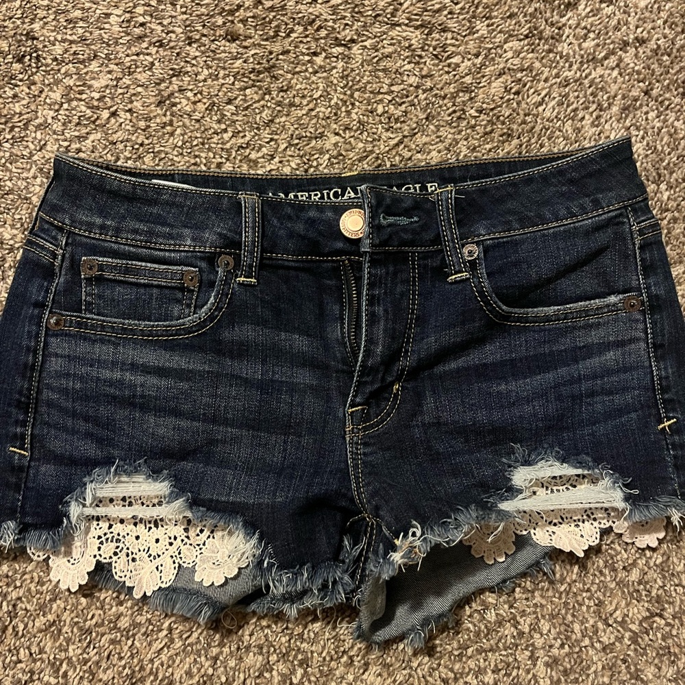 Shorts with lace pockets